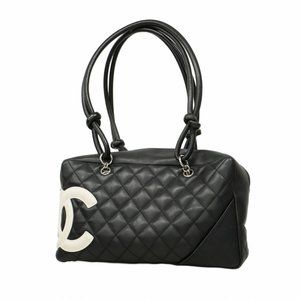 Chanel Cambon handbag in lambskin, black and white, for women